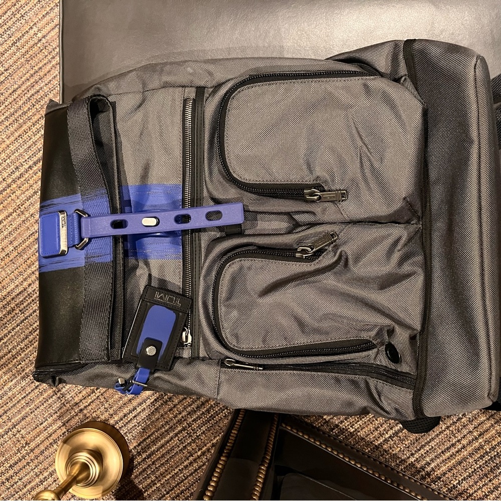 Like new Tumi Roll-Top backpack.